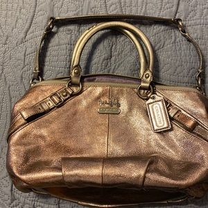 Coach shoulder bag.  Silver with purple interior.